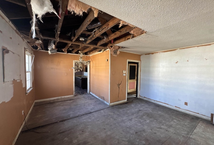 Unfurnished room with baseboards