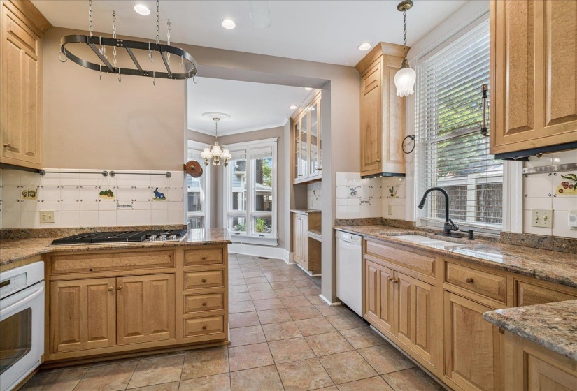 Features new Kitchen Aid Gas Downdraft Cooktop