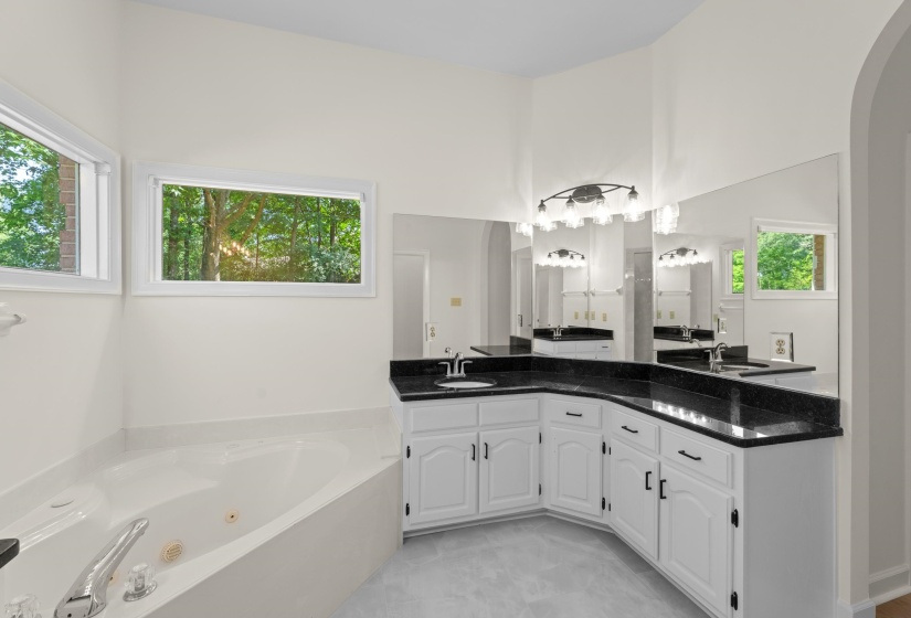 Bathroom with a whirlpool tub and double vanity