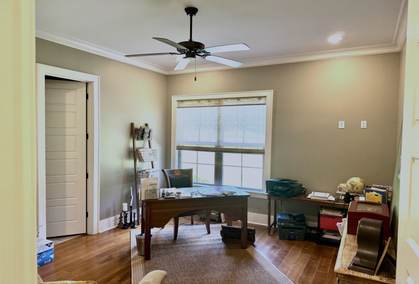 Home office  or 2nd bedroom down crown molding, and a ceiling fan  private bath with walk in closet