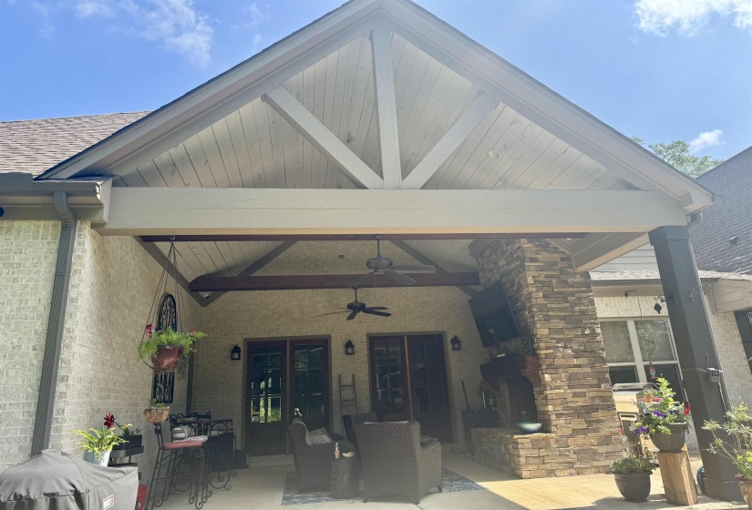 View of patio featuring 2 ceiling fan and french doors