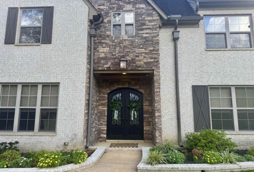 Double Iron doors and stone entry