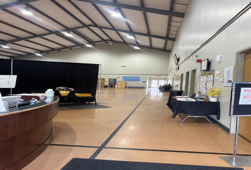 Welcome area featuring vaulted ceiling