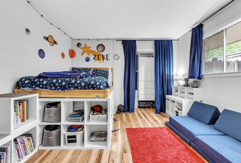Bedroom with wood finished floors