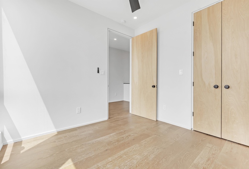 Unfurnished bedroom featuring light wood-style flooring, recessed lighting, baseboards, and ceiling fan