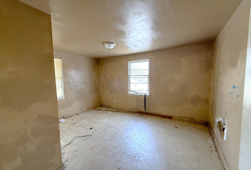 Unfurnished room featuring tile patterned floors