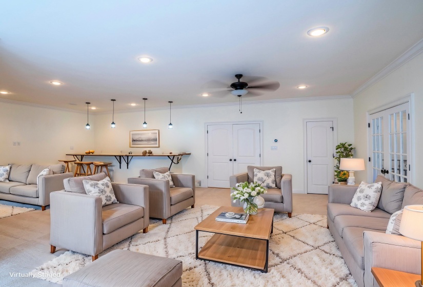 Second floor Living room featuring crown molding, recessed lighting, and a ceiling fan with Bar area for entertaining