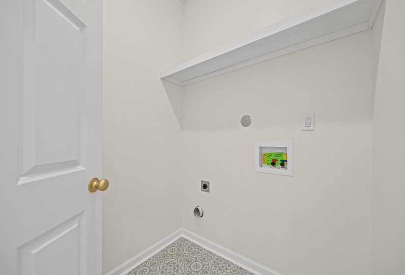 Washroom with washer hookup and electric dryer hookup