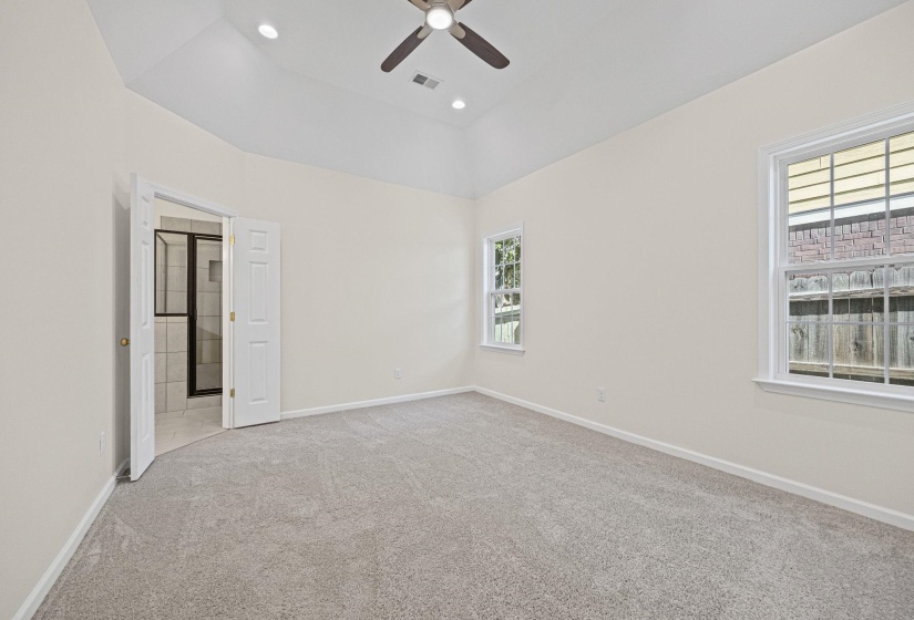 Unfurnished room featuring light colored carpet, recessed lighting, and ceiling fan