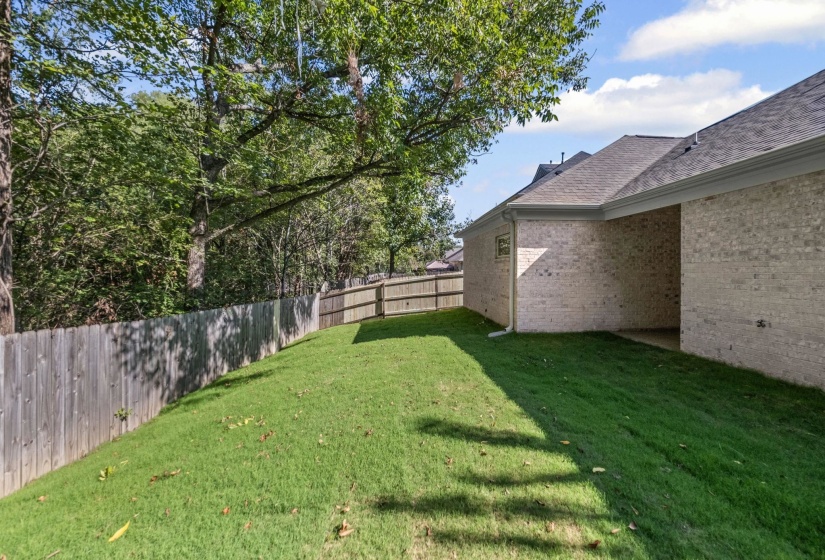 View of fenced backyard