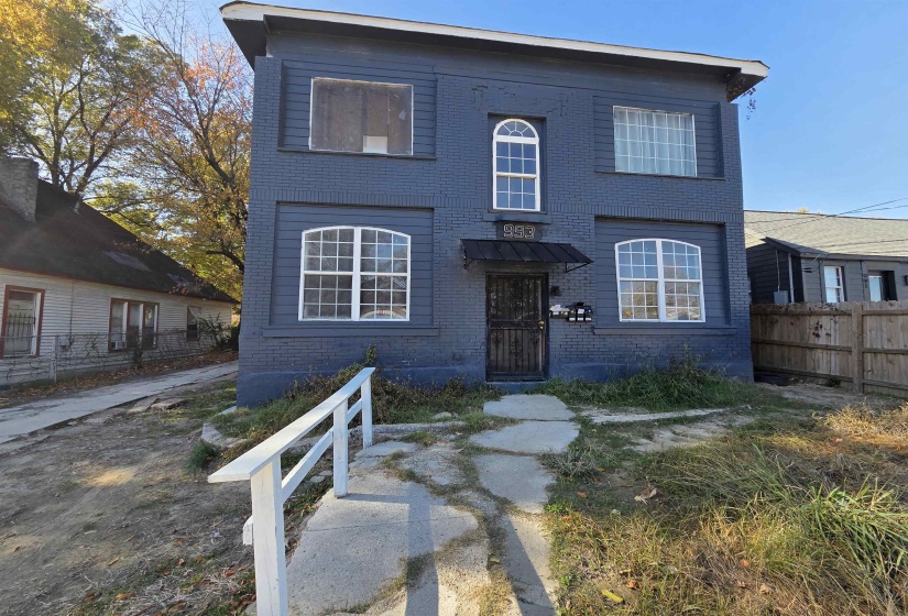 View of front of property featuring brick siding