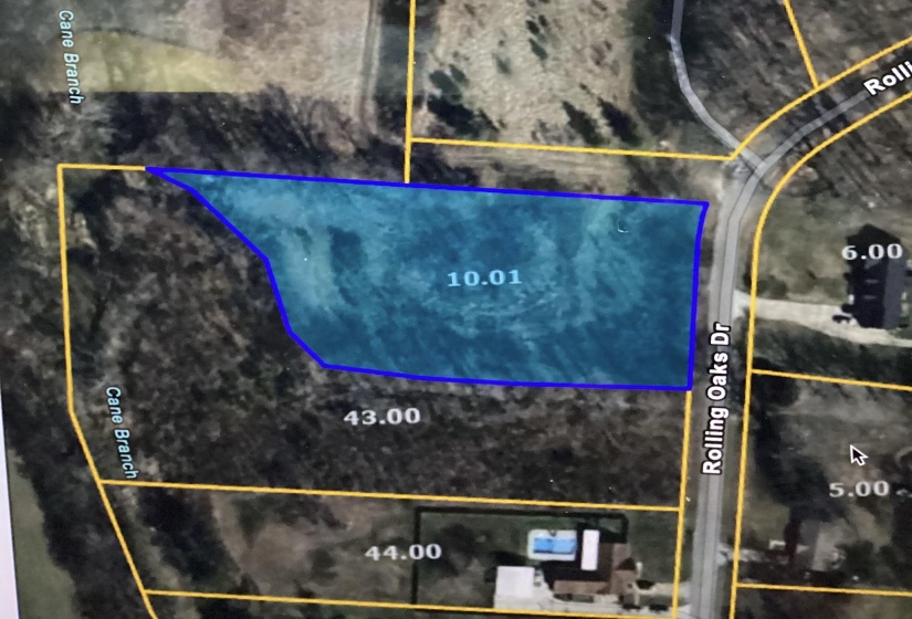 Aerial overview of property's location featuring property boundaries highlighted