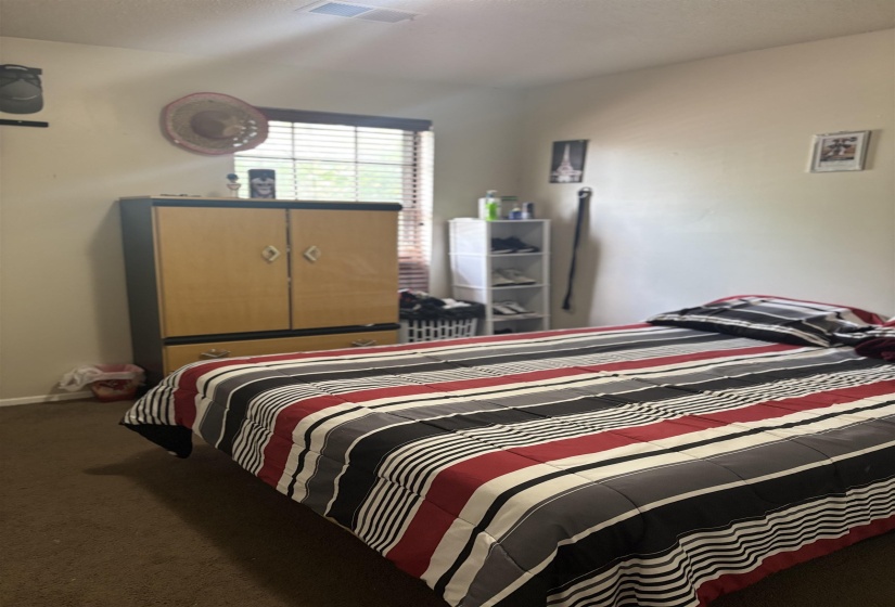 Bedroom with carpet