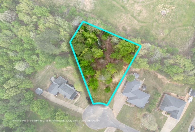Aerial view of property and surrounding area featuring property boundaries highlighted