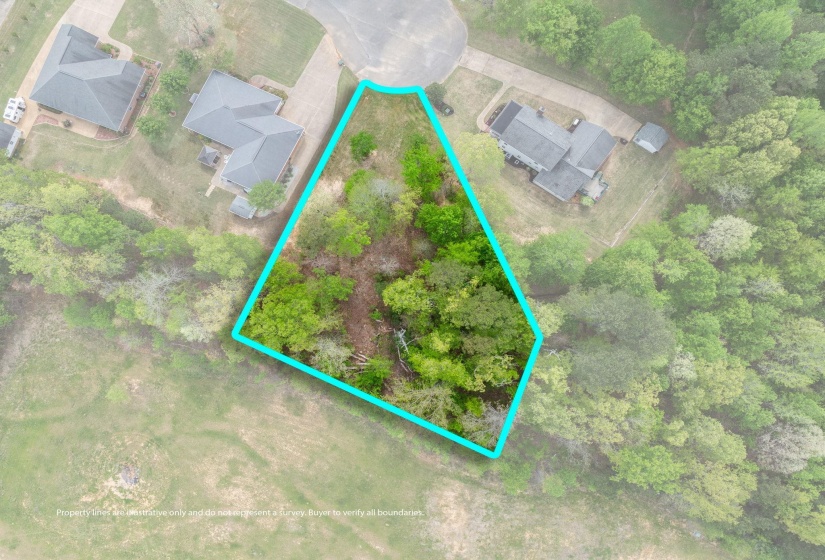 Aerial view of property and surrounding area featuring property boundaries highlighted