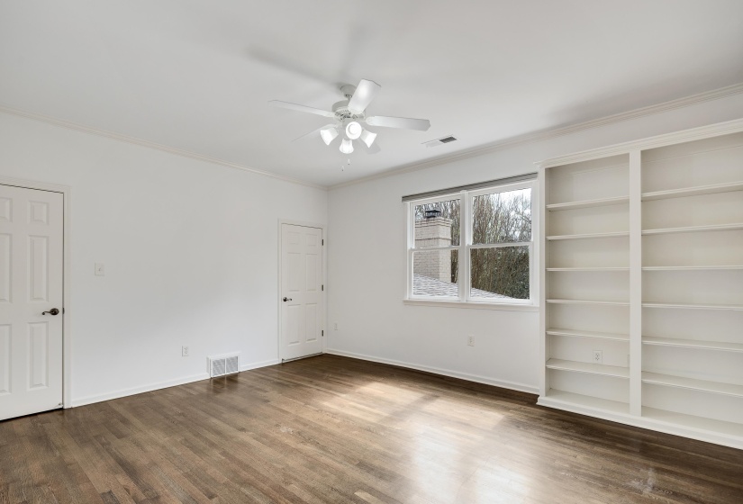each upstairs bedroom features a custom bookcase