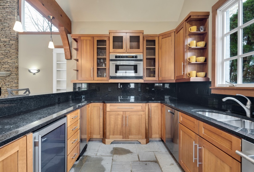 all ss appliance: fridge/freezer, microwave oven, sink, dishwasher, trash compactor, ice maker, beverage fridge. Plus built in wine rack!
