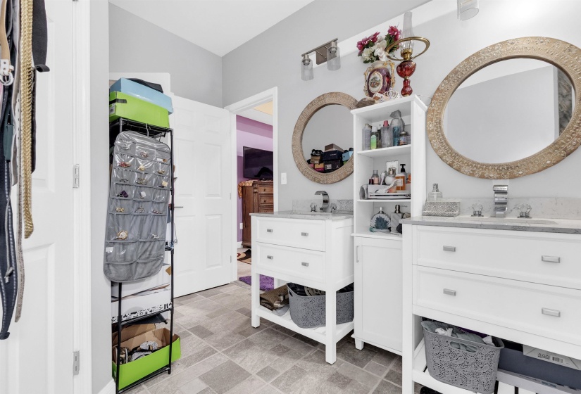 Full bath with two vanities