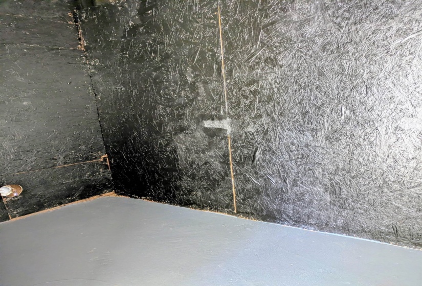 Storage room has dryer connection, water heater and cabinet