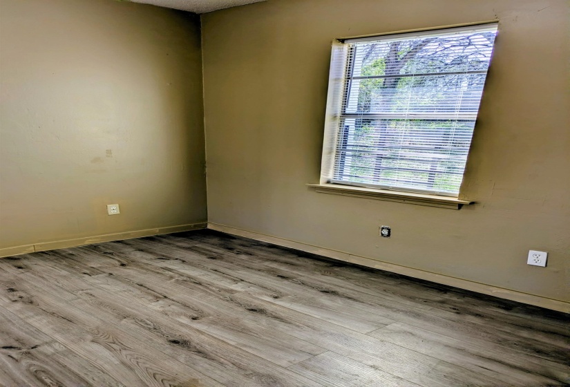 Breakfast area with light wood-style flooring and baseboards