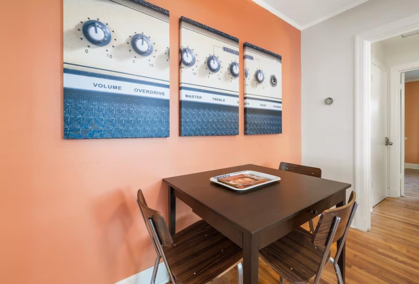 Dining space with wood finished floors