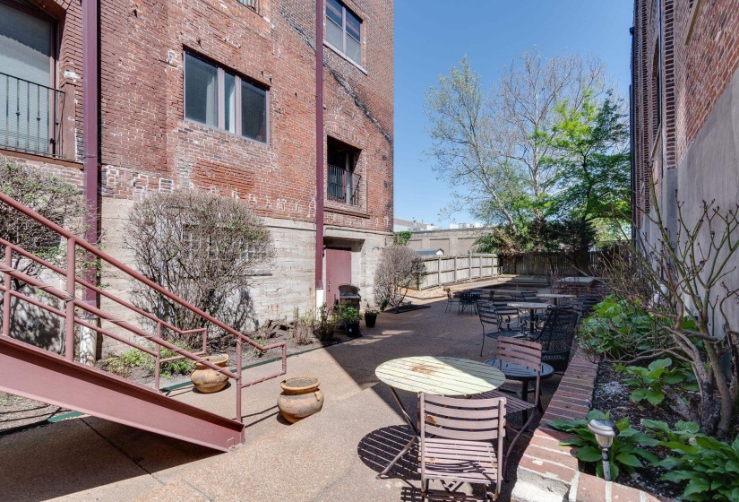 Fenced backyard featuring outdoor dining area and a patio