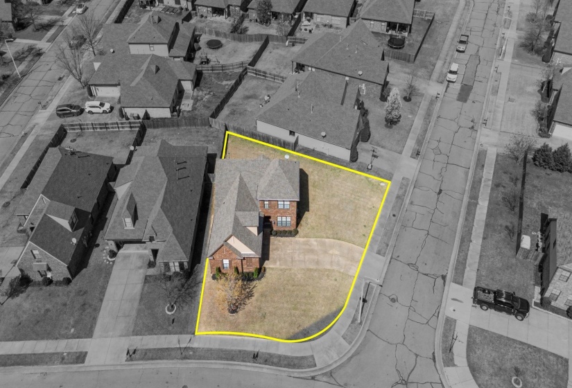 Aerial perspective of suburban area featuring property parcel outlined