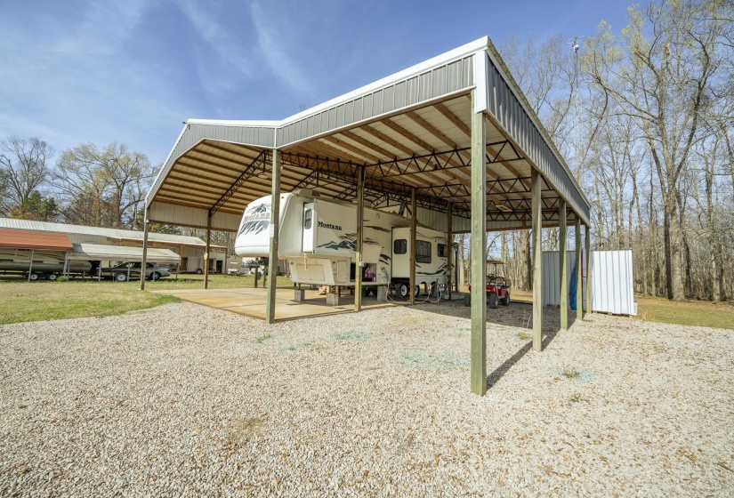 View of patio / terrace with a detached carport