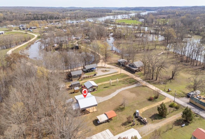 View of property location with a nearby body of water