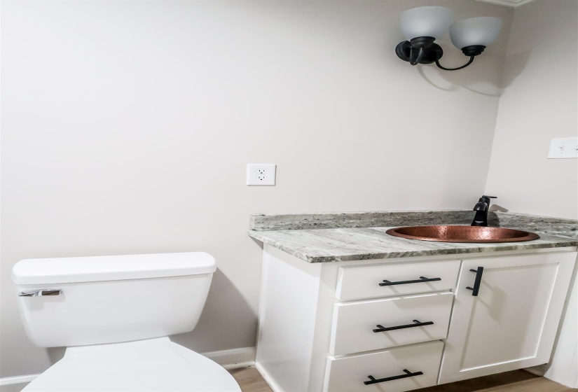 Bathroom with vanity and toilet
