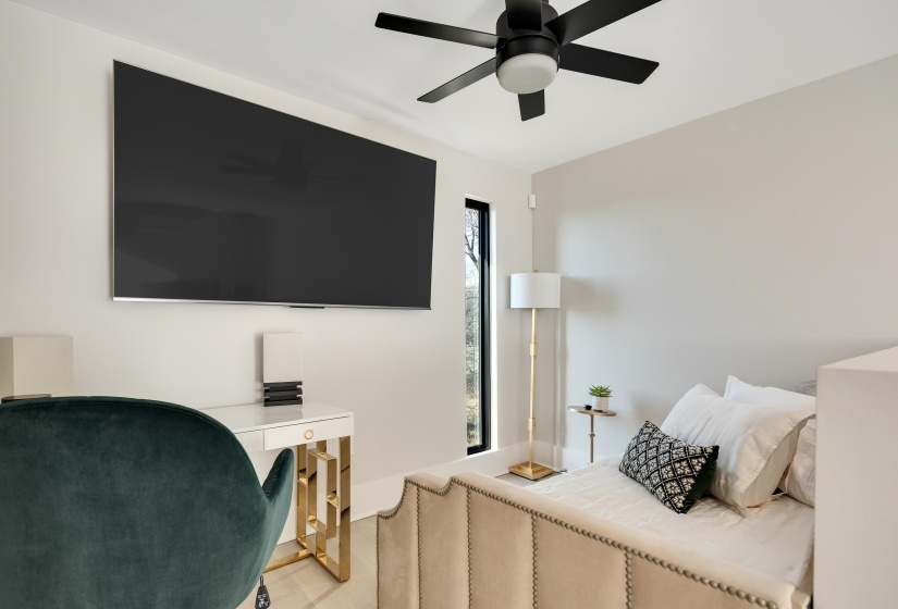 Bedroom with a ceiling fan