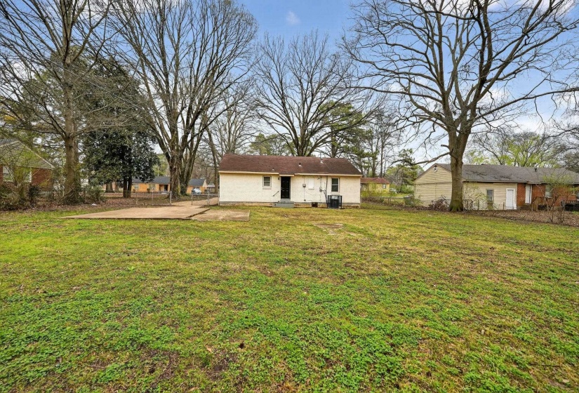 Back of house featuring a patio area and crawl space