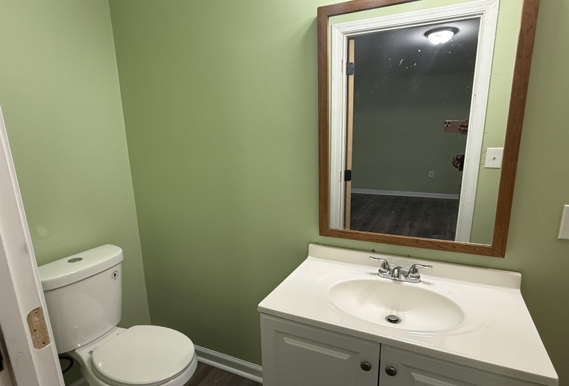 Half bath with toilet and vanity