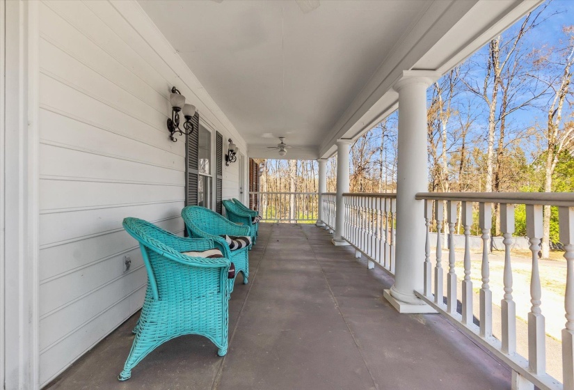 Covered porch with a ceiling fan