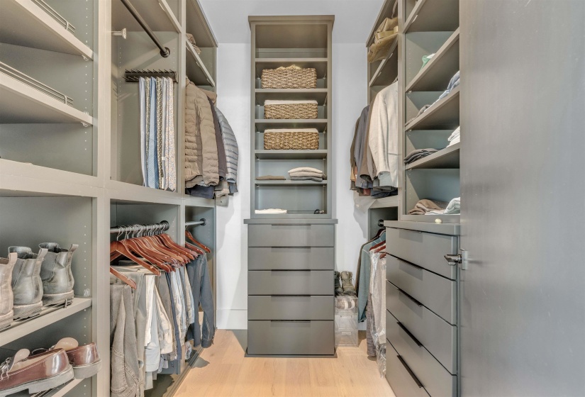 Walk in closet featuring light wood-style flooring