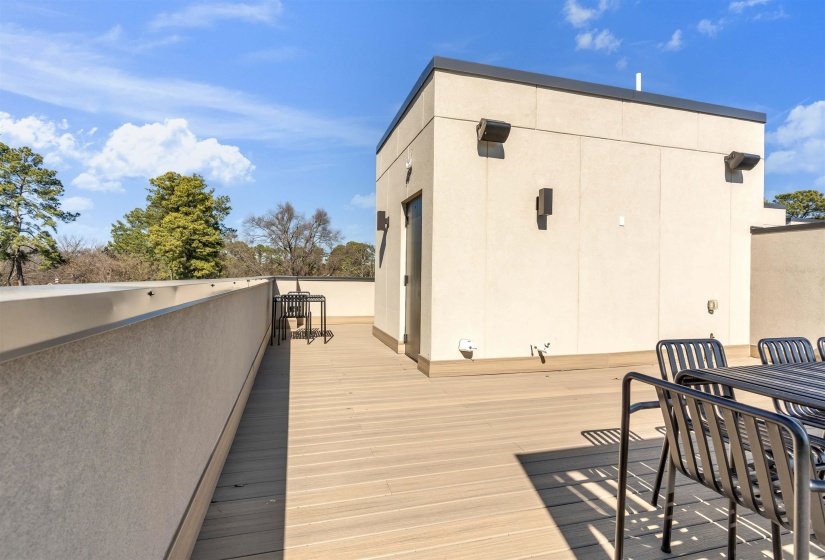 Wooden deck with outdoor dining area