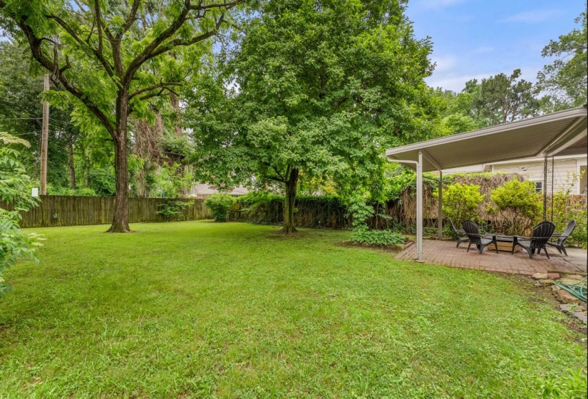 Fenced backyard featuring a patio area