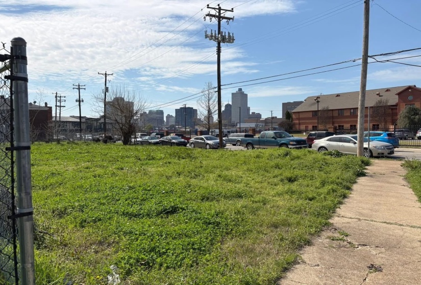 View of yard with a city view