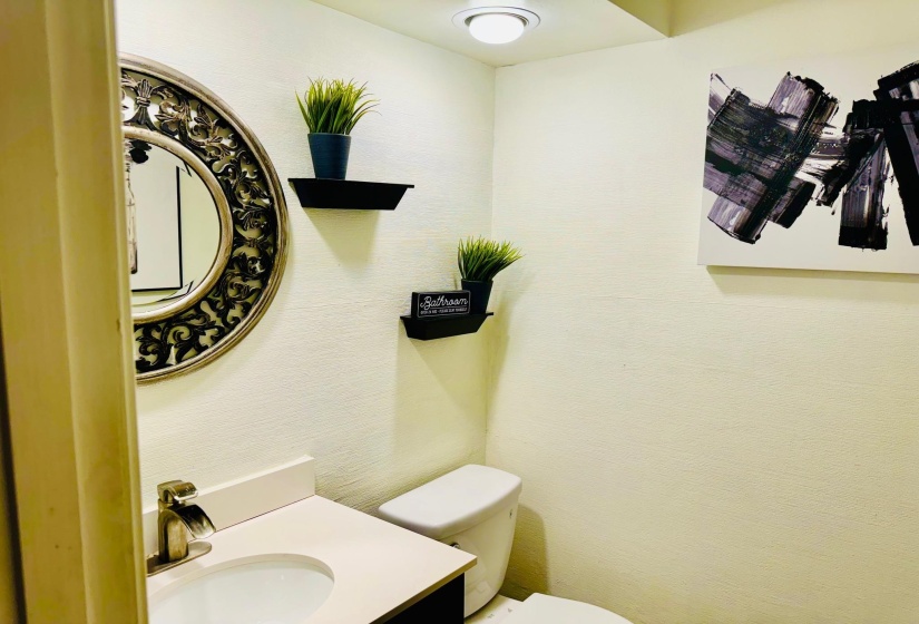 Bathroom with vanity and toilet