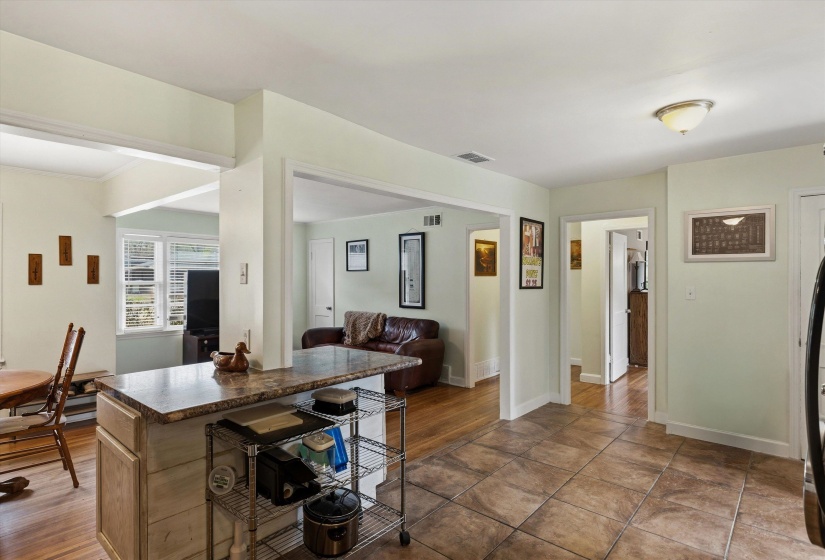 Kitchen with dark countertops and baseboards
