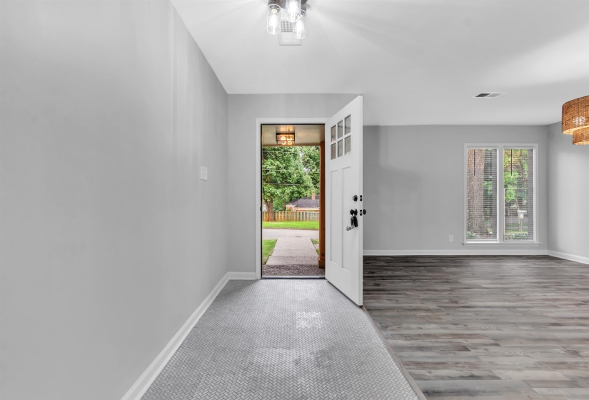 Entryway featuring healthy amount of natural light and baseboards