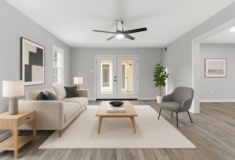 Living room featuring wood finished floors and ceiling fan