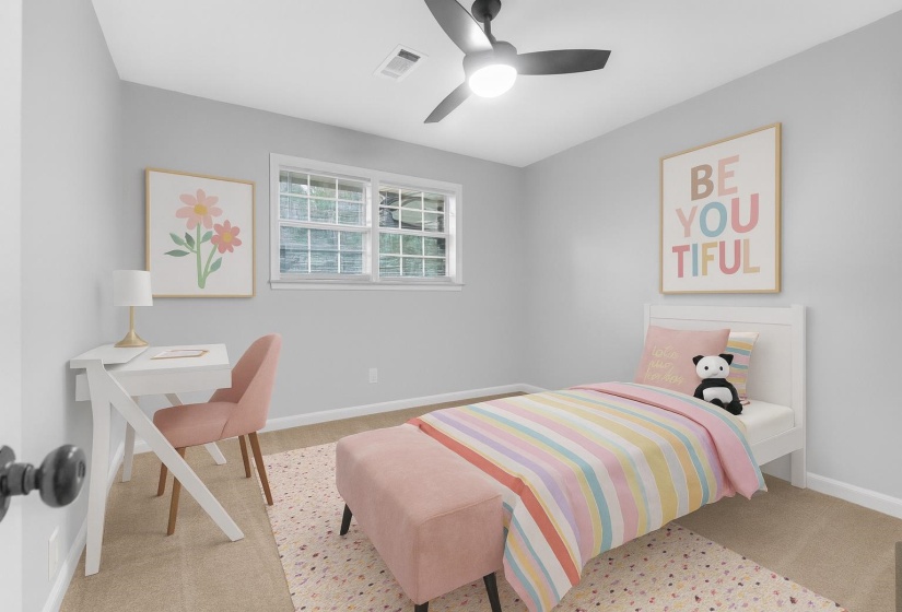 Bedroom featuring a ceiling fan and light colored carpet