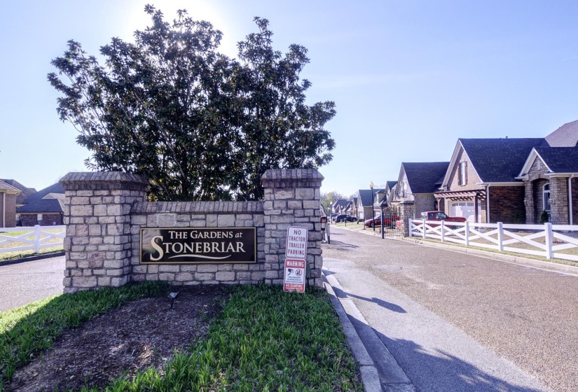 Community sign with a residential view