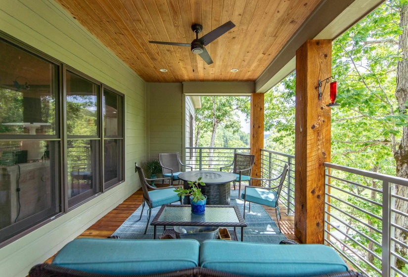 Exterior space featuring ceiling fan and outdoor lounge area
