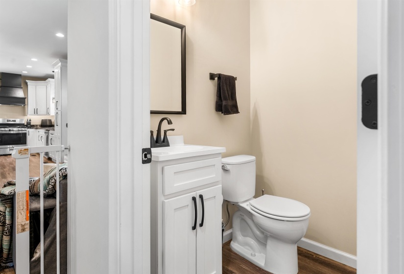 Half bath in downstairs hallway