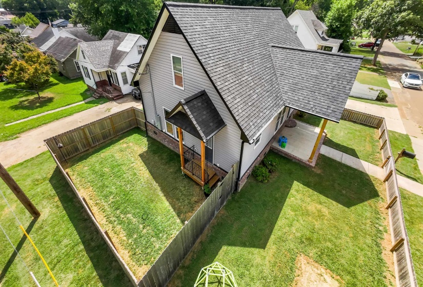Aerial view of fenced in side yard