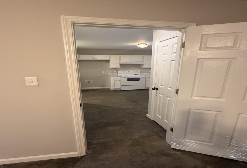 Corridor featuring baseboards
