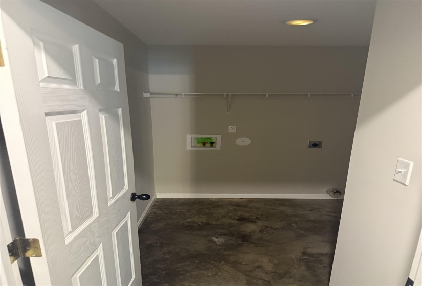 Washroom featuring washer hookup, electric dryer hookup, and recessed lighting