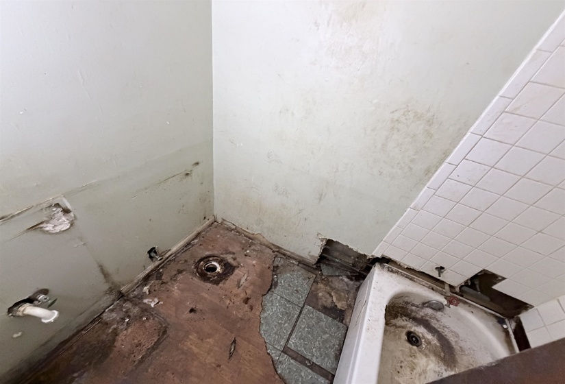 Full bathroom with a bath
